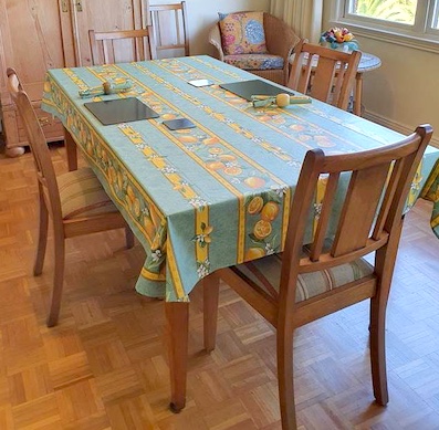 green and gold treated provencal tablecloth with lemons designs