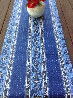 blue and white coated table runner