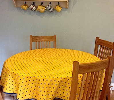60 in round coated tablecloth.