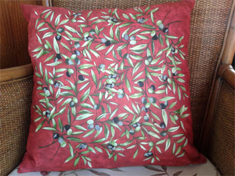 Provencal coated cushion with olives design