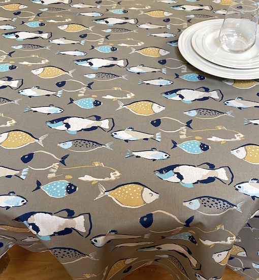 Pesci taupe acrylic coated french tablecloth seats 8 with fish designs
