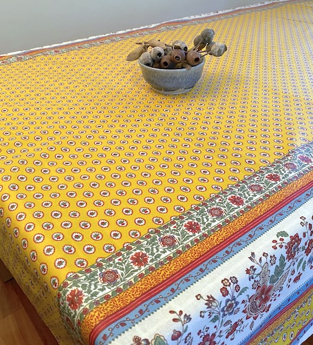 yellow and pink coated provencal tablecloth